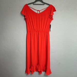 Contemporary dress with ruffle sleeves